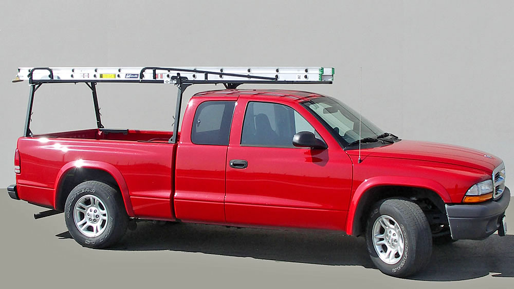  Rail Rack II with Extension Carrying a 24-foot Extension Ladder