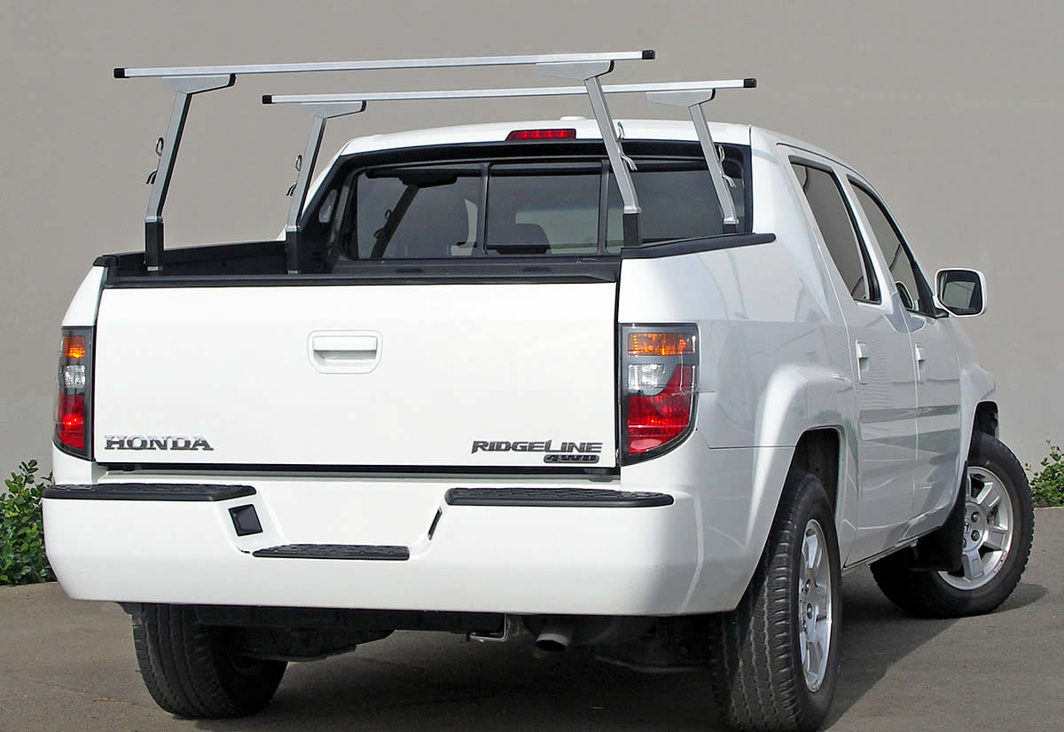 The Honda Ridgeline Rack 1 has Thule-size extruded aluminum crossbars that work with many sports accessories