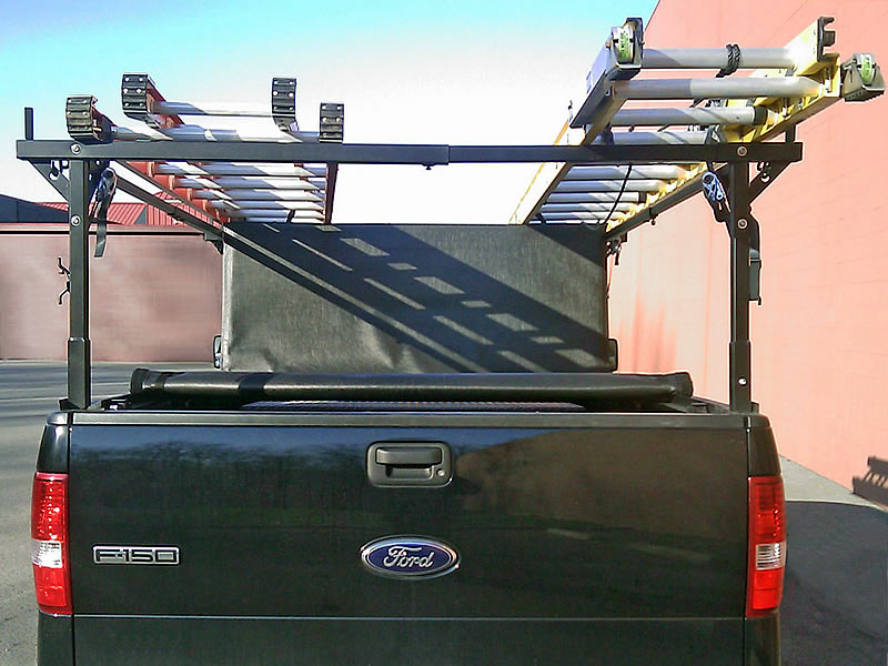 The Extra-Wide Stake Pocket Rack with two ladders and a Folding Tonneau Cover