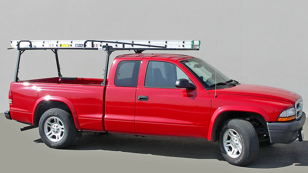 Rail Rack II with Extension Carrying a 24-foot Extension Ladder